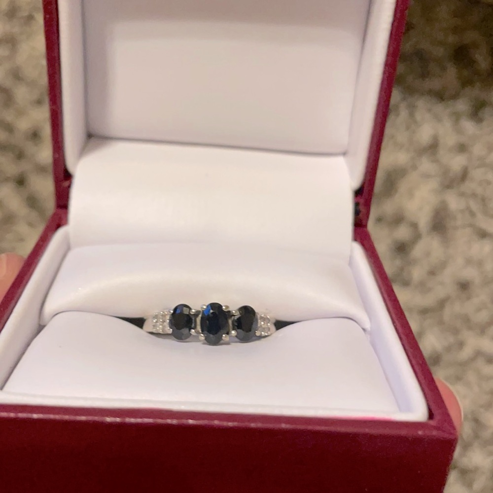 10k white gold and 3 stone sapphire ring.